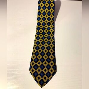 Tommy Hilfiger, blue and gold tie hundred percent silk made in the USA